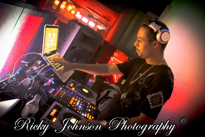 DJ working at a professional event setup